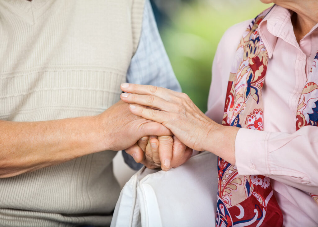 senior receiving in-home care support during a morning routine with a caregiver